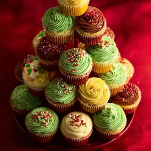 A beautifully decorated cupcake Christmas tree for holiday celebrations.