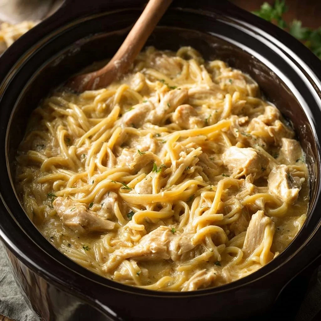 Delicious slow cooker chicken and noodles served in a bowl.