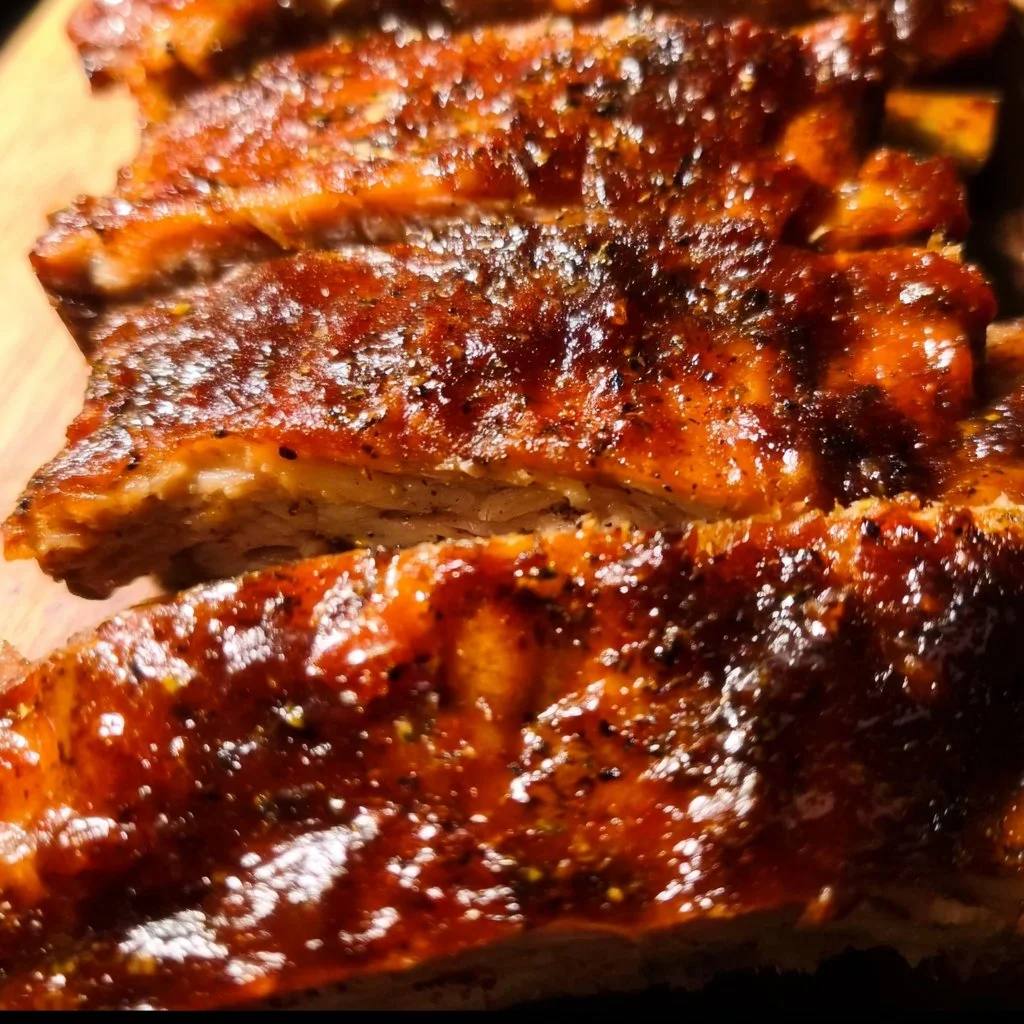 Delicious and tender Crock Pot baby back ribs served on a plate