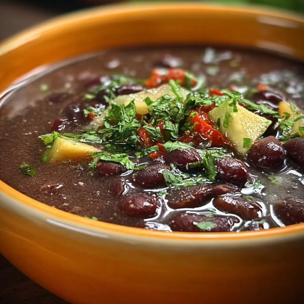 Bowl of easy and delicious black bean soup garnished with cilantro
