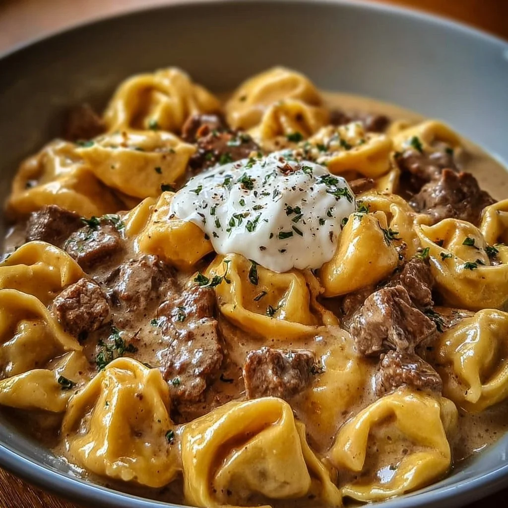 Creamy skillet beef stroganoff with tortellini in a skillet dish