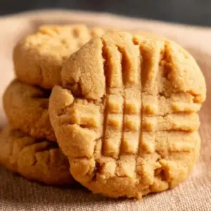 Freshly baked soft peanut butter cookies on a plate