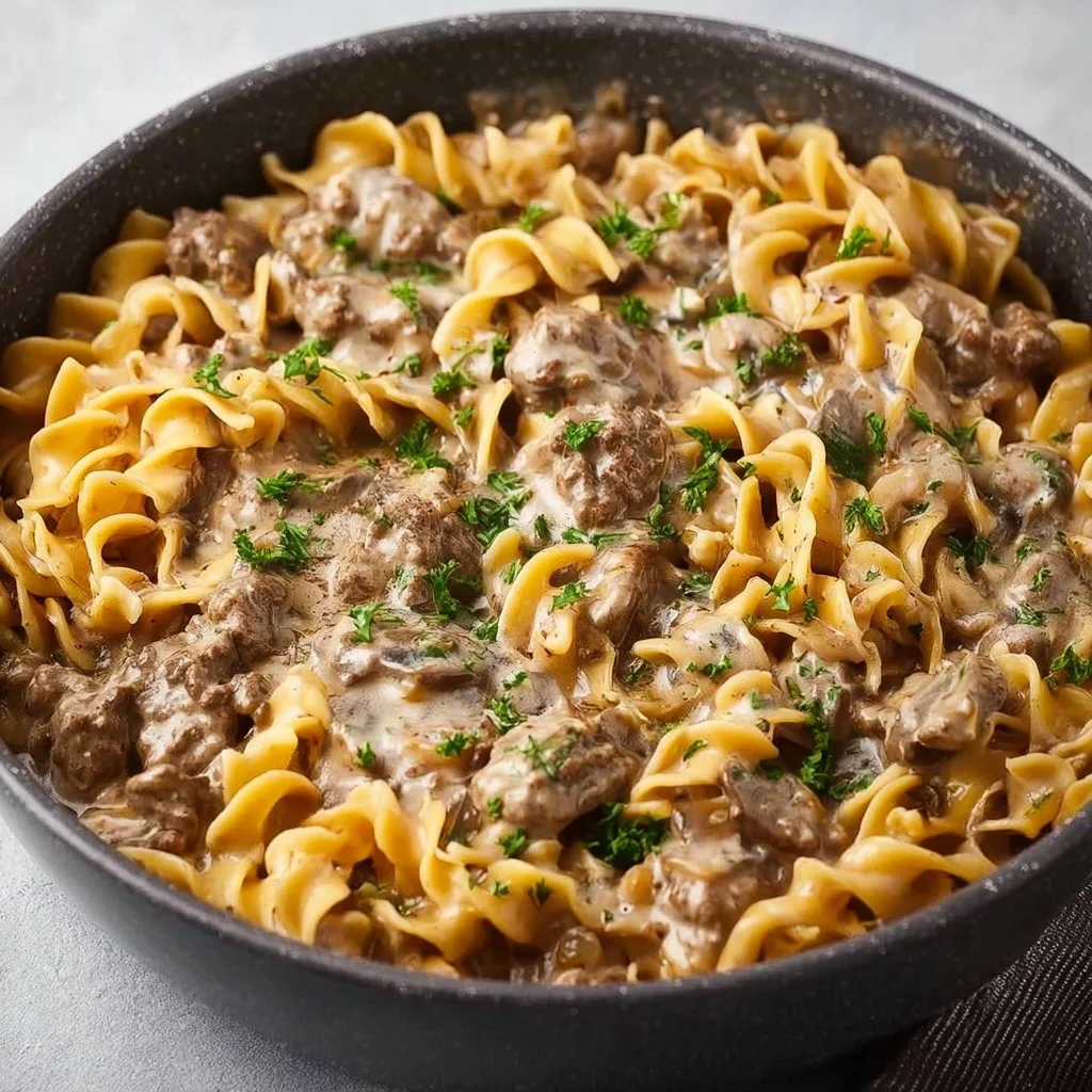 Quick and creamy beef stroganoff served on a plate with noodles