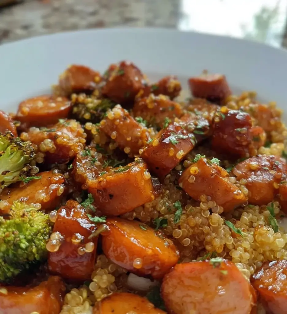 Healthy quinoa chicken sausage bowl with colorful vegetables