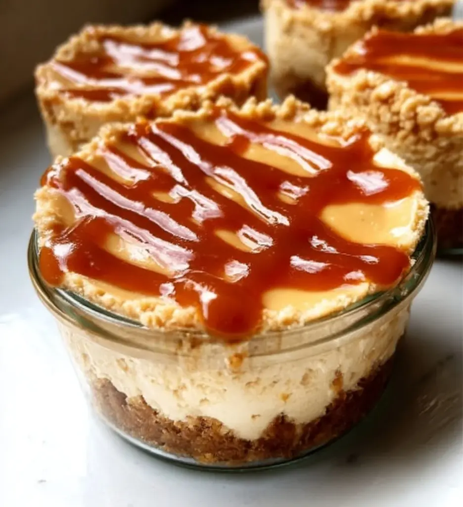 Delicious peanut butter cottage cheese cheesecake cups served in elegant dessert cups.